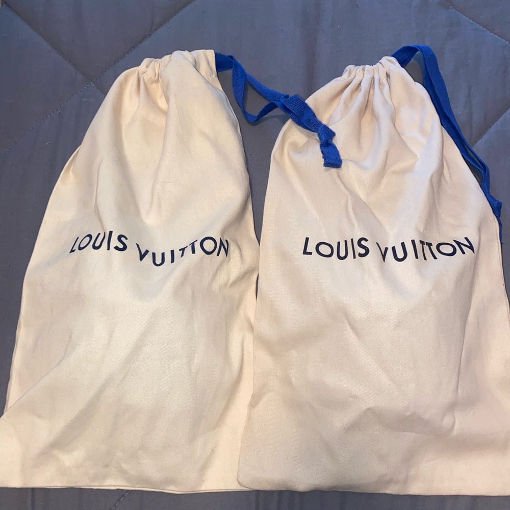 Men’s LV slides. Lightly used but in great condition.